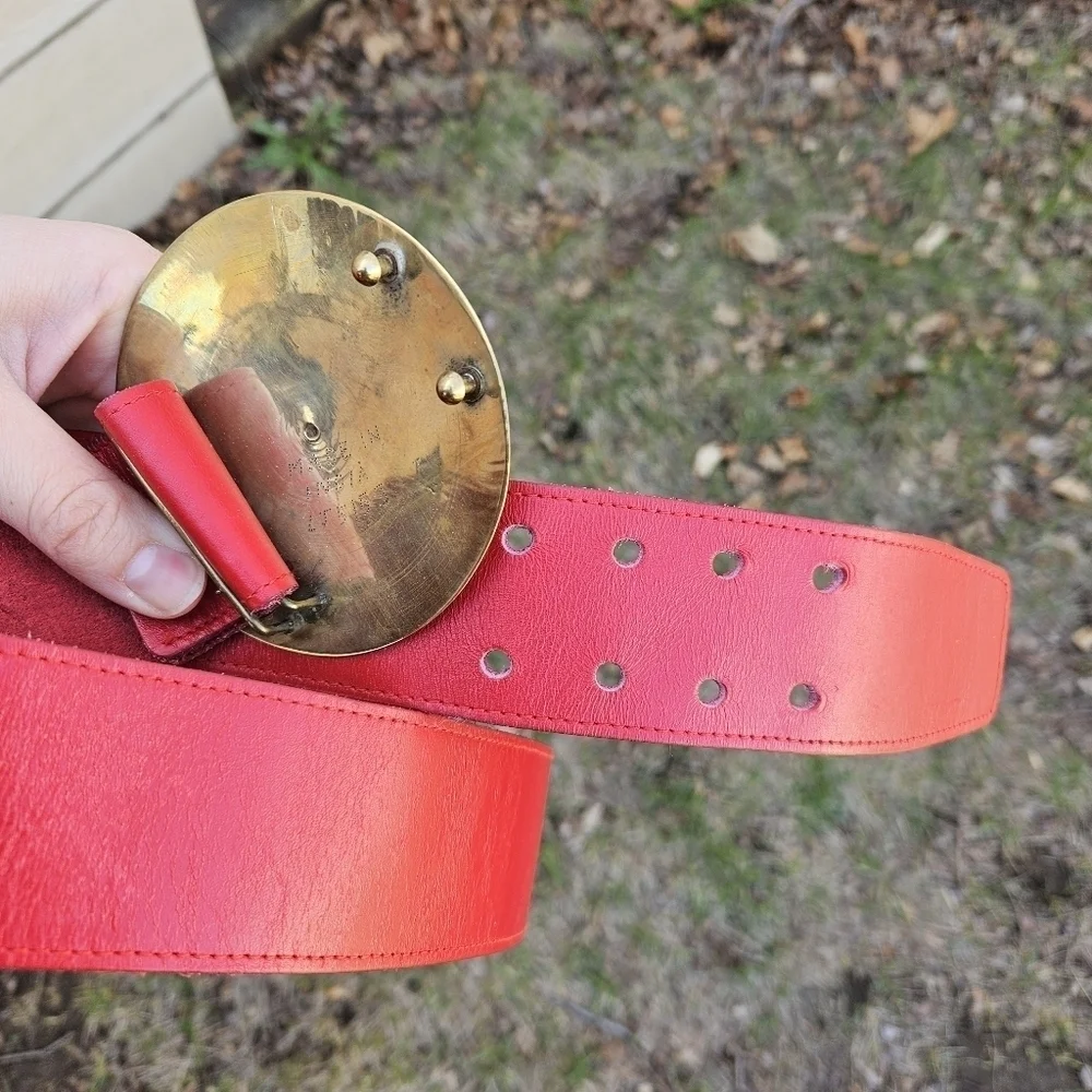 vintage Golden Hands wide red belt with round enamel brass buckle